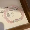Princesa em Fuga Pulseira de Quartzo Rosa com Contas, Zircônia e Laço de Pérola Doce e Delicada Design Exclusivo Joia de Mão
