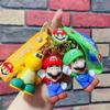 Llavero creativo y lindo de dibujos animados de Super Mario para coche, bolso escolar, colgante para coche, regalo exquisito al por mayor
