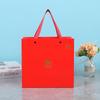 Bolsa de papel tridimensional de mano recubierta con estampado en caliente, impresión de logotipo personalizado, embalaje, bolsa de regalo, bolso de mano de regalo comercial, venta al por mayor