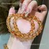 [Qiao en] pulsera de cristal natural grande de oro para hombre pulsera de joyería DIY al por mayor personalidad nicho cristal torre amarilla de cristal