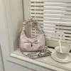 Bolsa de dumpling de nicho 2026 verão nova versátil bolsa transversal de corrente super quente pequena bolsa de mão feminina