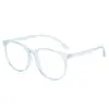 Gafas planas de moda anti luz azul con montura redonda, casuales y lindas, realzan el rostro, versátiles para fotografía callejera y uso casual