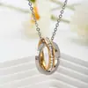 Cadena Nueva de Acero de Titanio con Forma de O Transfronteriza Collar de Doble Anillo para Mujer Versión Coreana Colgante Popular Europeo y Americano Venta Directa de Fábrica para Mujer