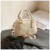 Bolso de Mano Moderno Tipo Bolso de Bolos para Mujer 2026 Principios de Primavera Nuevo Estilo Coreano Bolso de Hombro Sencillo Diseño Nicho Bolso Cruzado para Mujer