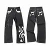 Jeans bordados con notas musicales retro americanos, unisex, nueva colección de otoño, corte holgado, efecto adelgazante, pantalones largos casuales de pierna recta únicos, modernos