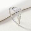 Anillo de acero inoxidable con personalidad, diseño geométrico hueco de amor, chapado en oro de 18 quilates, de titanio y acero.