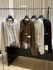 Conjunto de duas peças feminino: Cardigan de manga longa estilo coreano doce de outono com um botão + Camiseta de manga curta com gola U 66992