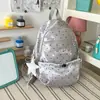 Mochila pequeña con colgante de lunares y estrellas estilo Ins, mochila versátil multicolor para el campus, los desplazamientos y viajes cortos para chicas