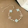 Popular Colección de Pulsera y Collar de Trébol de Cuatro Hojas Azul Sal Marina con Goteo de Aceite, Joyería de Lujo Ligero Versátil de Alta Gama Personalizada para Mujer