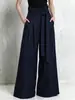 Pantalones de pierna ancha de algodón y lino de cintura alta, estilo europeo y americano para mujer, con cintura plisada de papel, tirantes de amarre y un corte holgado y fluido, adecuados para ir al trabajo.