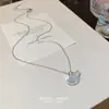 Acessórios de Moda da Coreia do Sul Colar de Pérola e Titânio para Mulheres Colar Versátil de Nicho Corrente de Clavícula de Luxo Leve Elegante Tendência