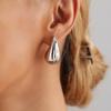 Europa y Estados Unidos muestran transfronterizamente aretes retro estilo punk de lágrima de coma, aretes colgantes simples y suaves de nicho