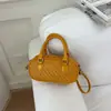 Bolso de textura tejida para mujer 2026 nuevo estilo moderno de verano tacto de alta gama bolso de mano tipo bola de boliche bolso cruzado de un solo hombro para el trabajo