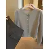 Cárdigan de punto calado de encaje azul de manga larga para mujer, principios de otoño, de alta gama, único, hermoso, suave y juvenil, suéter suave y acogedor
