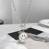 Collar giratorio con cara sonriente de expresión de acero de titanio, estado de ánimo artístico, para hombres y mujeres, cara llorando, colgante hip hop de doble cara, joyería, cadena para suéter
