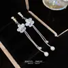 Nuevos Pendientes Coreanos Exquisitos de Flor de Zirconia con Borlas para Mujer, Adelgazantes y de Estilo Hada, Pendientes Largos de Moda y Elegantes
