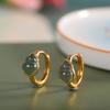 Carácter plata moda nacional moda aretes plata s925 chapado en oro damas material peligroso aretes de calabaza de jade clip de oreja simple