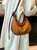 Bolsas Femininas de Nicho Transfronteiriças 2026 Nova Bolsa Transversal Versátil Vintage Moda Bolsa de Ombro/Axila Camurça Formato Bolinho