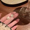 2026 Aretes de Perlas Estilo Nuevo Aguja de Plata S925 Lujo Ligero Aretes de Gama Alta Diseño de Nicho Versátiles Elegantes Aretes para Mujer