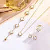 Set de trébol de cuatro hojas de acero de titanio de doble cara transfronterizo de Amazon: pulsera, collar, pendientes, anillo, juego de cuatro piezas, joyería que no se decolora
