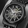 Explosiones de comercio exterior moda de negocios tendencia hombres reloj de doble cara hueco calendario correa de acero reloj de cuarzo una generación de pelo