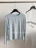 Camiseta Feminina de Botão Simples Meio Cardigan de Manga Longa com 46% Algodão, Look Emagrecedor, Camisa Top para Camadas Outono e Inverno 2025