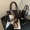 Bolsas de Design Nicho Texturizadas Outono 2026 para Mulheres Bolsa de Ombro Versátil Bolsa de Ombro de Alto Padrão Bolsa Transversal Bolsa de Mão
