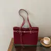 Otoño 2026 Nueva Moda Tendencia Decoración de Cinturón Sensación de Alta Gama Gran Capacidad Versátil Bolso de Hombro Bolso de Mano Bolso Tote Cruzado