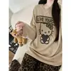 Pijamas femininos no atacado para exportação, coleção primavera e outono, com um design de desenho animado doce e fofo, feitos de tecido semelhante ao algodão, com gola redonda, mangas compridas e um estilo solto e casual, perfeitos para ficar em casa.