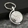 Venta al por mayor de llaveros de globo metálico giratorio listos para enviar, colgantes de mapa del mundo, regalos promocionales y regalos para el Día del Maestro