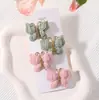 Traje de Pasador de Pelo Tejido a Mano de Lana Europeo y Americano Mariposa Enrollada Pasador de Color Sólido Suave Todo-partido Tocado para Bebé 3841