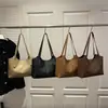 Bolsas Tote Retrô Europeias e Americanas para Mulheres Nova Coleção Primavera 2026 Bolsa de Ombro Grande para o Dia a Dia Bolsa de Mão para Trabalho Bolsa Grande Feminina de Ombro Único