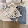 Ropa infantil coreana para niñas pantalones rectos 2026 verano finos nuevos elegantes de pierna ancha casuales cortos para niñas