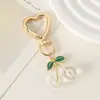 2026 Nuevo Colgante para Bolso Llavero Aleación Estilo Ins Lindo Colgante de Cereza Cinco Colores Cinco Estilos Disponibles