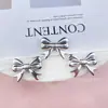 Novos Acessórios para Joias de Laço Perfurado Galvanizado a Prata DIY Sapato com Furo Acessórios de Cabelo Capa de Celular Acessórios de Corrente Adesivo