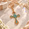 Chaveiro criativo de cruz transfronteiriço, liga de zinco com cruz de strass, chave de carro e pingente de bolsa, presente no atacado