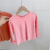 2022 otoño e invierno camiseta de algodón para niños de cuello redondo manga larga color sólido niños y niñas bebé camiseta base niñas primavera y otoño
