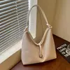 Bolsa de ombro transversal de outono tecida para axila feminina 2026 novo modelo grande capacidade casual simples para trabalho