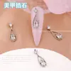 Popular en línea popular joyería para uñas chapada en oro circonita gota de agua joyería para uñas de alta gama exquisita estrella Luna diamante para uñas al por mayor