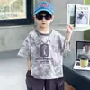 Conjunto de Verano para Niños Fresco y Elegante 2026 Nueva Versión Coreana Ropa para Niños Pequeños Bebés Conjunto de Dos Piezas de Manga Corta de Verano Tendencia