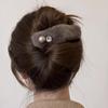 Nueva horquilla de pelo de alta gama con clip de perla de peluche de Corea del Sur y diamantes de imitación, sencilla y combinable con todo.