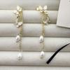 Pendientes largos con borlas de mariposa, exquisitos y dulces, de nueva moda, con diseño de nicho para mujer, con perlas de imitación.