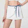 Minifalda deportiva anti-exposición para mujer, bloques de color, falso dos piezas, cordón, falda de tenis, secado rápido, con bolsillos, falda de yoga