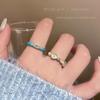 Anillo de esmalte azul de fritillaria súper blanco para mujer, diseño de nicho, anillo ajustable con apertura para el dedo índice, anillo ligero de lujo de alto nivel.