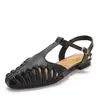 Sandalias planas tejidas de estilo retro francés con punta fina, diseño de tira en T calada y puntera cerrada, zapatos romanos de verano ZK527-3