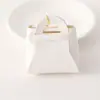Nuevo Monedero Creativo Color Caramelo Llavero de Auriculares Moda Femenina Bolso de Almacenamiento de Cuero Versátil Colgante Regalo