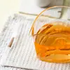 Taza de té de vidrio de borosilicato alto en forma de gota de agua, resistente al calor, estilo japonés, separador de té, mar de té transparente, nueva taza de té, taza de té uniforme, alta transparencia