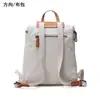 Mochila de Design Novo Original Adequada para Homens e Mulheres, Lona com Detalhes em Couro, Bolsa de Viagem Casual de Cor Sólida, Mochila Escolar