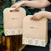 Bolsa para Empaque de Café de Celebridad de Internet Bolsa de Papel Kraft con Hebilla Creativa Bolsa para Llevar Bebidas de Té con Leche Bolsa Impresa con Logo