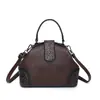 Bolsas Femininas 2026 Novo Estilo Retrô Couro Macio Bolsa Concha Esculpida Bolsas Femininas com um Toque de Luxo